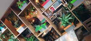 an overhead view of a room filled with plants at SriKrishna Paradise Hotel Thane Navi Mumbai in Thane