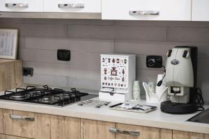 a coffee maker sitting on a counter in a kitchen at Micky House in San Marzano sul Sarno