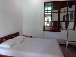 Katil atau katil-katil dalam bilik di Hotel Santa Helena