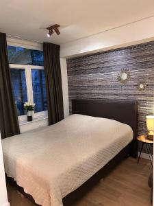 Postel nebo postele na pokoji v ubytování Luxury Leidseplein with Private Patio