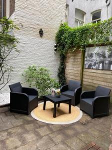 Posezení v ubytování Luxury Leidseplein with Private Patio + 52 fotografií