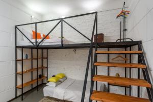 a bunk bed in a room with a bunk bed in a room at Простора квартира в центрі міста біля площі Філармонії in Chernivtsi +21 photos