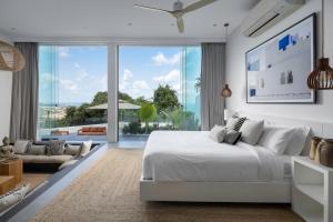 Ένα ή περισσότερα κρεβάτια σε δωμάτιο στο Luxury 6BR Villa Vie