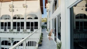 a view of a balcony of a building at Escotel Melasti in Uluwatu