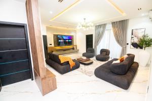 TV a/nebo společenská místnost v ubytování Velour stays