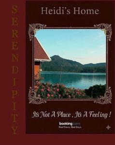 a book with a picture of a picture of a lake at Serendipity Lake Artistic Bungalow by Heidis Home in Nuwara Eliya