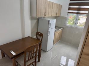 Apartmaniにあるキッチンまたは簡易キッチン