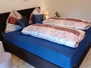 Postel nebo postele na pokoji v ubytování Appartementhaus Hochkönig 1 - Alpenrose