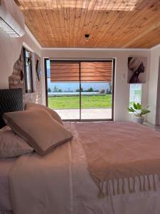 Ένα ή περισσότερα κρεβάτια σε δωμάτιο στο Casa Maly, valle de apalta, Santa Cruz +16 φωτογραφίες