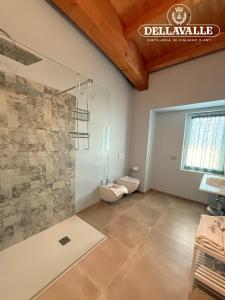 Ένα μπάνιο στο Dellavalle Guest House