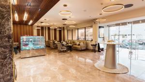 TV/trung tâm giải trí tại Mirada Gold Hotel - Albaghdadiyah
