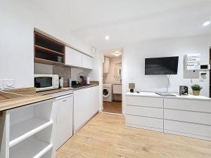 Kuchyň nebo kuchyňský kout v ubytování Studio coeur centre ville N1