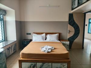Ένα ή περισσότερα κρεβάτια σε δωμάτιο στο Misty cloud homestay