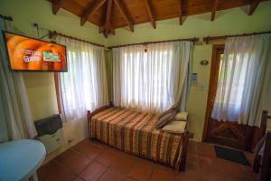 Ένα ή περισσότερα κρεβάτια σε δωμάτιο στο Apart Pampas de Gesell +49 φωτογραφίες