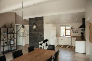 A kitchen or kitchenette at Harpa Holiday Home - Birta Rentals