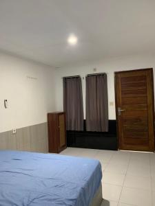 Katil atau katil-katil dalam bilik di Nova Homestay