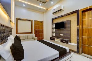 TV a/nebo společenská místnost v ubytování Hotel O Crystal Crown