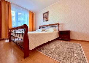 Una cama o camas en una habitación de Apartment Kadriorg, Tallinn