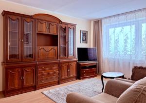 Una televisión o centro de entretenimiento en Apartment Kadriorg, Tallinn