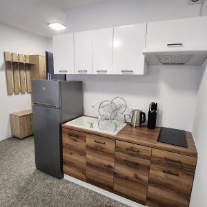 Dapur atau dapur kecil di Kawalerki Mazurski Zdroj