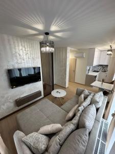 TV a/nebo společenská místnost v ubytování Apartman Nitra