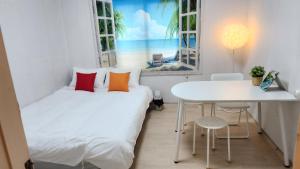 Voodi või voodid majutusasutuse 마린미니하우스 toas