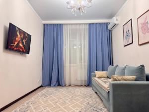 Posezení v ubytování Апартаменты в ЖК Ирина рядом с Баянтау