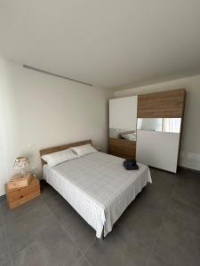 Postel nebo postele na pokoji v ubytování B&B Bozzini's Nest