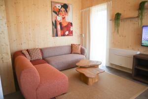 a living room with a couch and a table at Vlugtenburg in s-Gravenzande