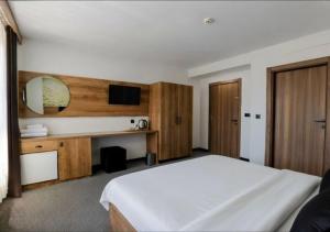 Ένα ή περισσότερα κρεβάτια σε δωμάτιο στο Acar Airport Hotel