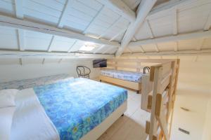 two bunk beds in a room with a ceiling at Hotel Sans Souci in Rimini +85 photos