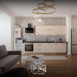 Η κουζίνα ή μικρή κουζίνα στο Sika Metropolis Grand Apartment