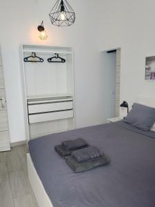 Ένα ή περισσότερα κρεβάτια σε δωμάτιο στο Casita María Angustia