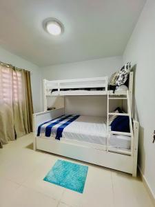 Postel nebo postele na pokoji v ubytování Bavaro Breeze Retreat