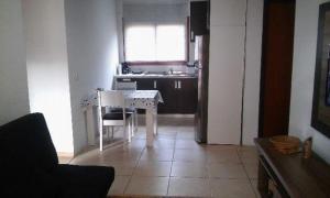 A cozinha ou cozinha compacta de Apartamento Assis Brasil