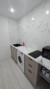 Η κουζίνα ή μικρή κουζίνα στο Мангилик Ел 10