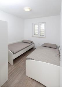 Ένα ή περισσότερα κρεβάτια σε δωμάτιο στο House Nane Garden +11 φωτογραφίες