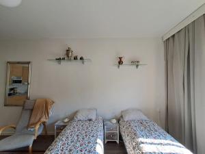 Ένα ή περισσότερα κρεβάτια σε δωμάτιο στο Bright and spacious studio in the vibrant city center