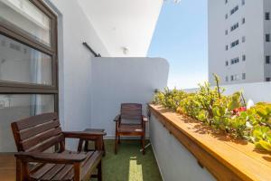 Балкон или терраса в Stylish Seaside living at Bay Point