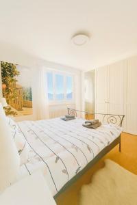 Giường trong phòng chung tại Casa di David - Maggiore it’s a kind of magic!