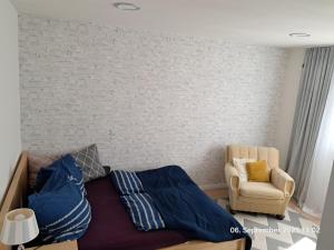 Ένα ή περισσότερα κρεβάτια σε δωμάτιο στο Wolfs Studio