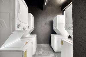 a white laundry room with white appliances at Myla Chapultepec in Mexico City +151 photos