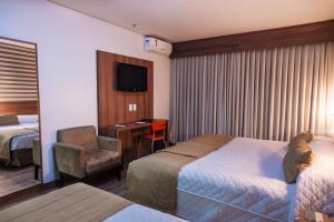 Una habitación de Hotel Continental Business - 200 metros do Complexo Hospitalar Santa Casa