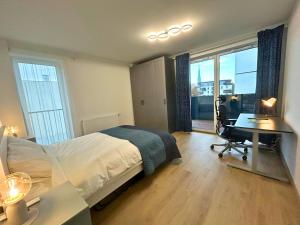 Katil atau katil-katil dalam bilik di Blisko PreZero Arena - Apartament przy Rynku z tarasem premium