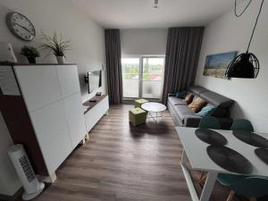 Χώρος καθιστικού στο Apartament Turkusowy 5 Mórz