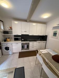 O bucătărie sau chicinetă la Appartamento Carboncina +3 fotografii