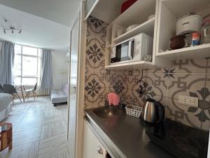 Η κουζίνα ή μικρή κουζίνα στο Center Apartment Studio