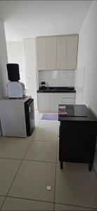 Kuchyň nebo kuchyňský kout v ubytování Ap Lagoa da Prata com Ar condicionado + 12 fotografií