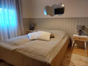 Postel nebo postele na pokoji v ubytování HankaKasi 3