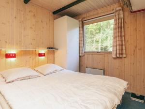 Postel nebo postele na pokoji v ubytování 8 person holiday home in Skals-By Traum